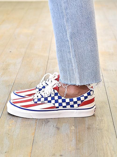 Checkered vans shop with red stripe