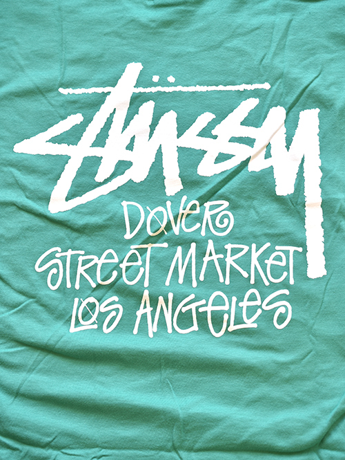 STUSSY STOCK DSM L.A ステューシー ドーバー コラボ Tシャツ Green アメリカ輸入品