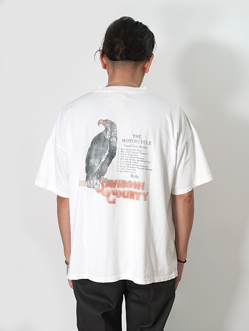 REMI RELIEF  NEW SP加⼯20/天竺BIGサイズ T（North Carolina Rally)  - Off White