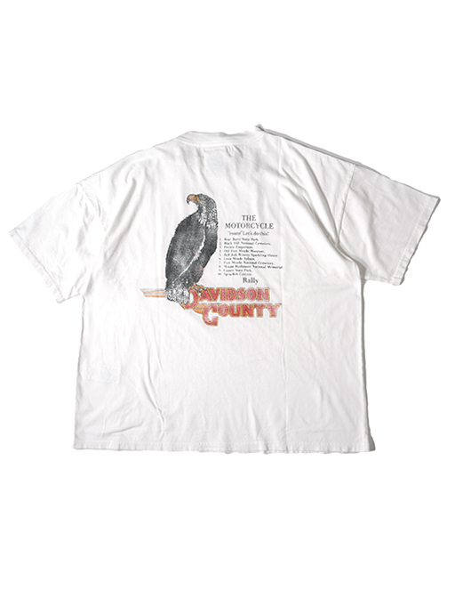 REMI RELIEF  NEW SP加⼯20/天竺BIGサイズ T（North Carolina Rally)  - Off White