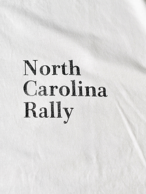 REMI RELIEF  NEW SP加⼯20/天竺BIGサイズ T（North Carolina Rally)  - Off White