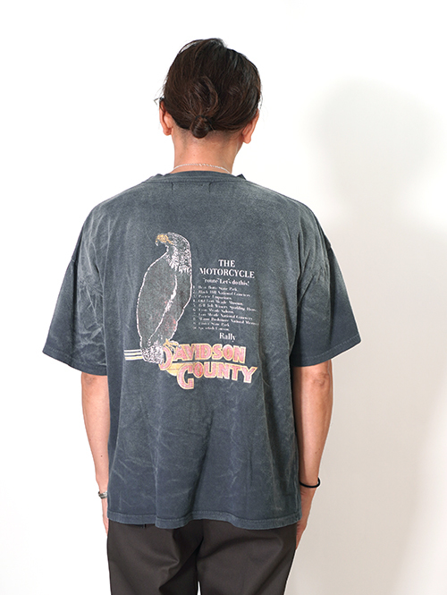 REMI RELIEF  NEW SP加⼯20/天竺BIGサイズ T（North Carolina Rally)  - Vintage Black